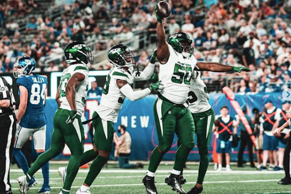 New York Jets spillere griber bolden